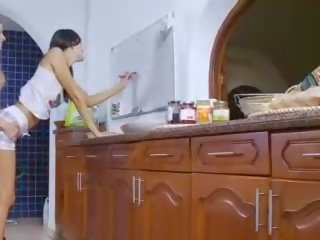 Girls trying oral sex in the kitchen