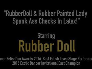 Rubberdoll & Rubber Painted Lady Spank Ass Checks in.