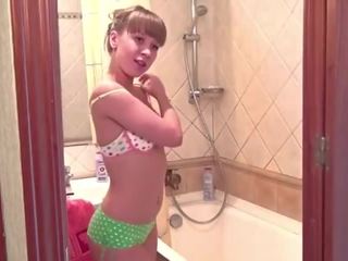 Young Carrie showing tits and pussy in a shower bathroom Porn Videos