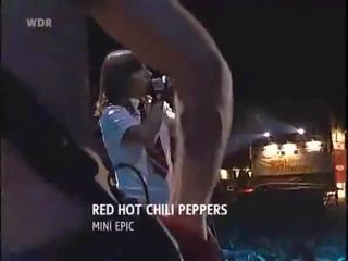 Merah panas chili peppers hidup di batu saya sedang cincin rockpalast 2004